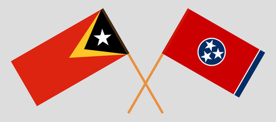 Crossed flags of East Timor and the State of Tennessee. Official colors. Correct proportion