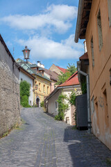 Fototapeta na wymiar Rose Street in Banska Stiavnica, Slovakia. Unesco World Heritage Site.