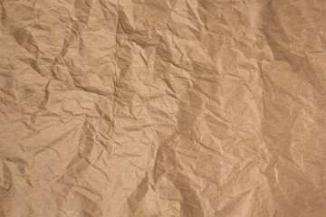Crumpled craft paper abstract background texture