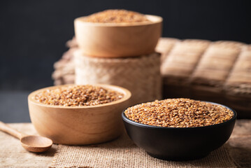 Brown flax seed in a bowl on wooden, Still Life