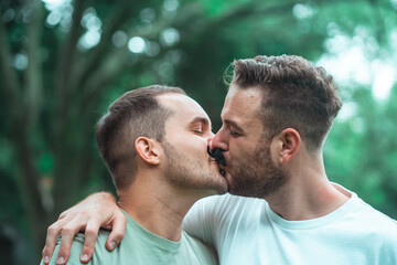 gay couple kissing each other 