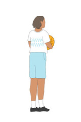 Young boy standing with basketball in arms