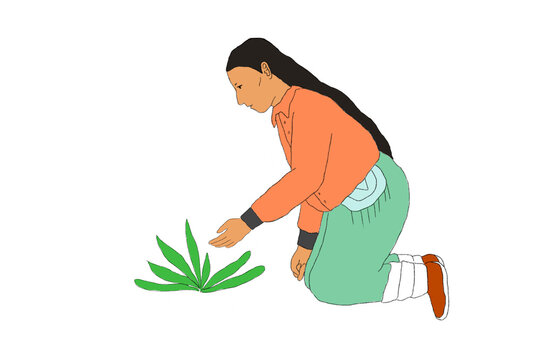 Indigenous woman kneeling and reaching out to care for plant