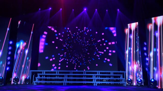 Animation of stage lights frame. Bright shiny stage lights flashing movement entertainment spotlight projectors in the dark, blue soft light spotlight strike on black background.