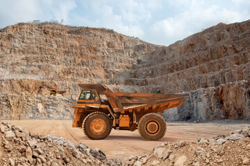Mining truck for limestone moving on road career.open pit mine industry.