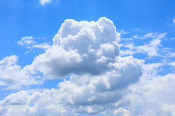 Naklejka na ściany i meble Blue sky and white clouds on a sunny day.