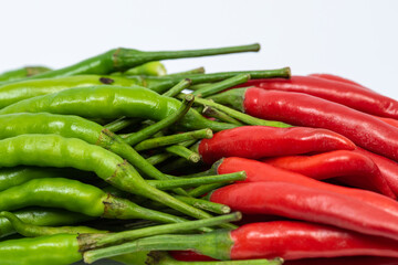 Red and green hot chili peppers isolated on white background. 