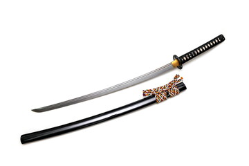 Japanese sword steel fitting and colorful cord with black scabbard isolated in white background. Selective focus.
