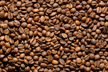 Texture of roasted coffee beans close-up