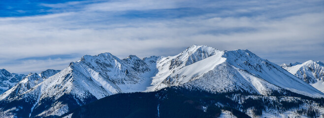 view of the peaks of the Tatra Mountains seen from the Łapszanka Pass. Winter landscape