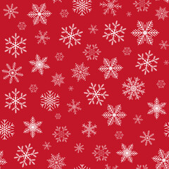Seamless vector illustration. Snowflakes on red background.