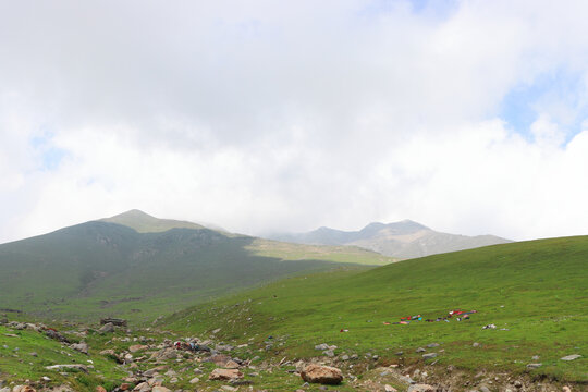 Cloudy Sky Over The Green Mountains