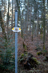 signpost for hikers in the forest