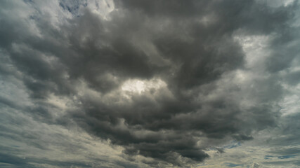 Dramatic storm clouds at dark sky in rainy season