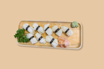 Engawa shushi display on dish, Japanese food.