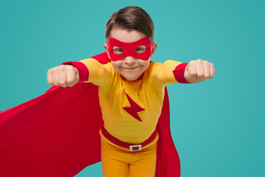 Superhero kid in super hero costume