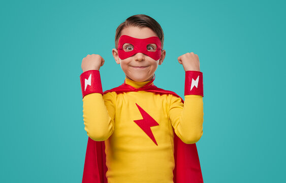 Excited superhero kid with funny face