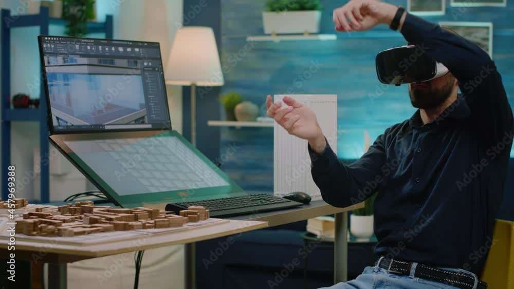 Poster Man engineer working with vr glasses to design building model for architectural development. Architect using digital goggles and creating construction layout. Virtual architecture