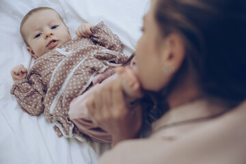 Woman with a baby. Beautiful mother with a baby. High quality photo