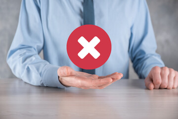 Hand holds icon,cancellation symbol,cancel icon.Cross mark flat red icon.round X mark.cancel...