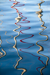 Blurry colorful abstract reflections on the water - 457972517