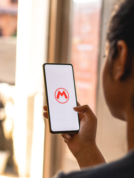 Assam, india - October 11, 2020 : Super mario logo on phone screen stock image.