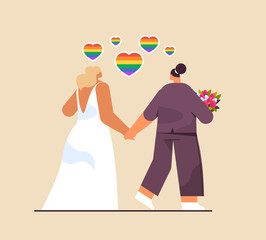 Obraz premium newlywed lesbian couple with flowers standing together transgender love LGBT community wedding celebration concept