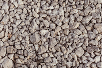 Top view of limestone gravel as background