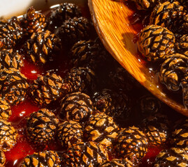 Jam from spruce cones close-up.