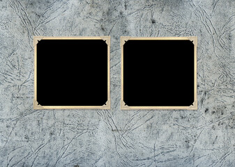 Two retro photos on cardboard photo album page