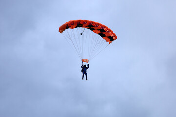 Skydiving. Parachute piloting. A parachute is in the sky.