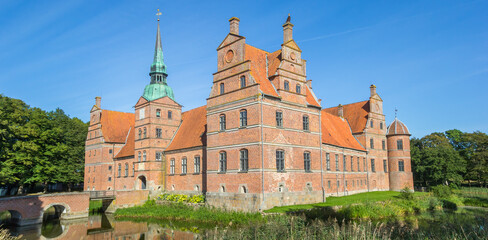 Panorama of the historic red brick castle in Rosenholm, Denmark