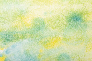 Watercolor background. Colored brush strokes of watercolor paint on white paper.