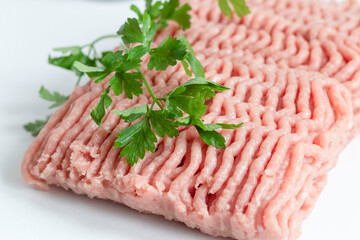 Raw turkey mince. On white background.