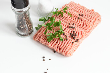 Raw turkey mince. On white background.