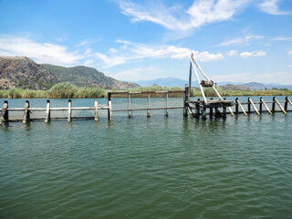 Vintage fish barriers on the river to regulate fish spawning