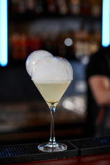 alcoholic cocktail with smoky air bubble at the bar.