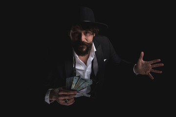 attractive businessman holding romanian money in his hand