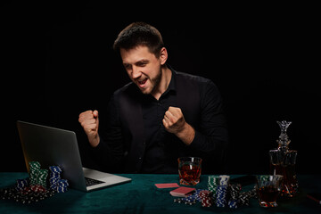 Bearded online casino player man celebrating victory