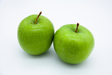 Twin green apples. Apples with white spots. Vitamin store green apple.
