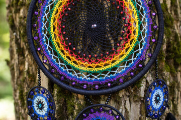 Handmade dream catcher with feathers threads and beads rope hanging