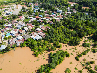 Aerial view river flood village countryside Asia and forest tree, Top view river with water flood...