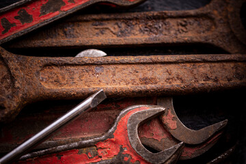 Old vintage construction tools. Hand tool on a dark background