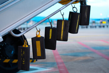 Close-up of airplane chocks hanging at passenger gangway at Zürich Airport. Photo taken September...