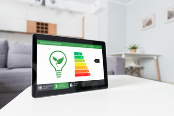 Energy efficiency mobile app on screen, eco house