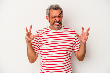 Middle age caucasian man isolated on white background  screaming with rage.