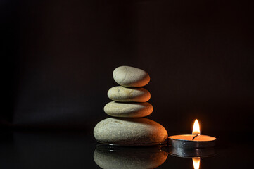 Fototapeta na wymiar zen stones and candle