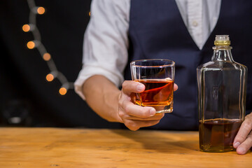 Bartender Serve Whiskey, on wood bar, 