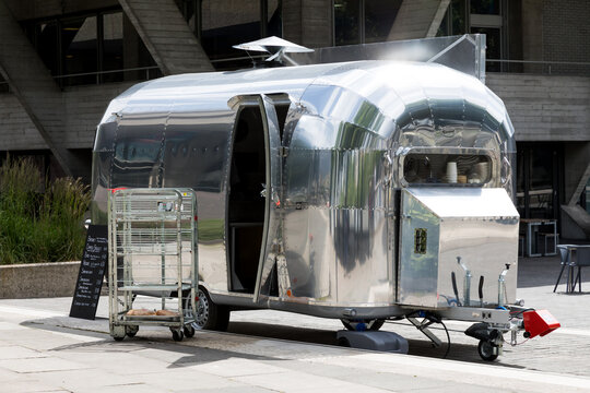 London, UK - 5 June 2017: Iconic Airstream Travel Trailer being used as a food truck on the South Bank of the Thames river in London, UK