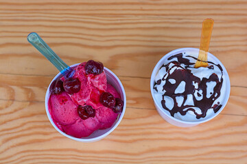 Top view Ice cream flavors in cup on blackground